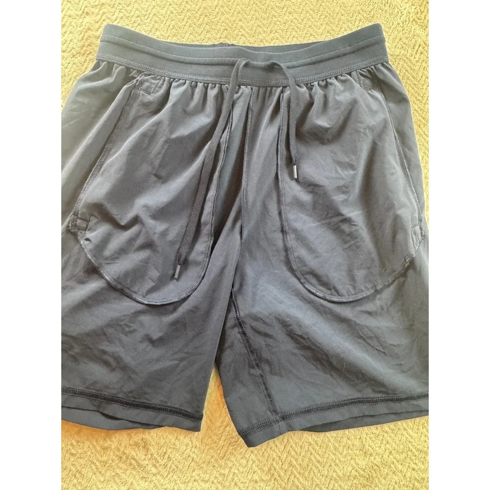 Nike Athletic Shorts Mens Blue Reflective Logo‎ Drawstring Zipped Pocket Stretch